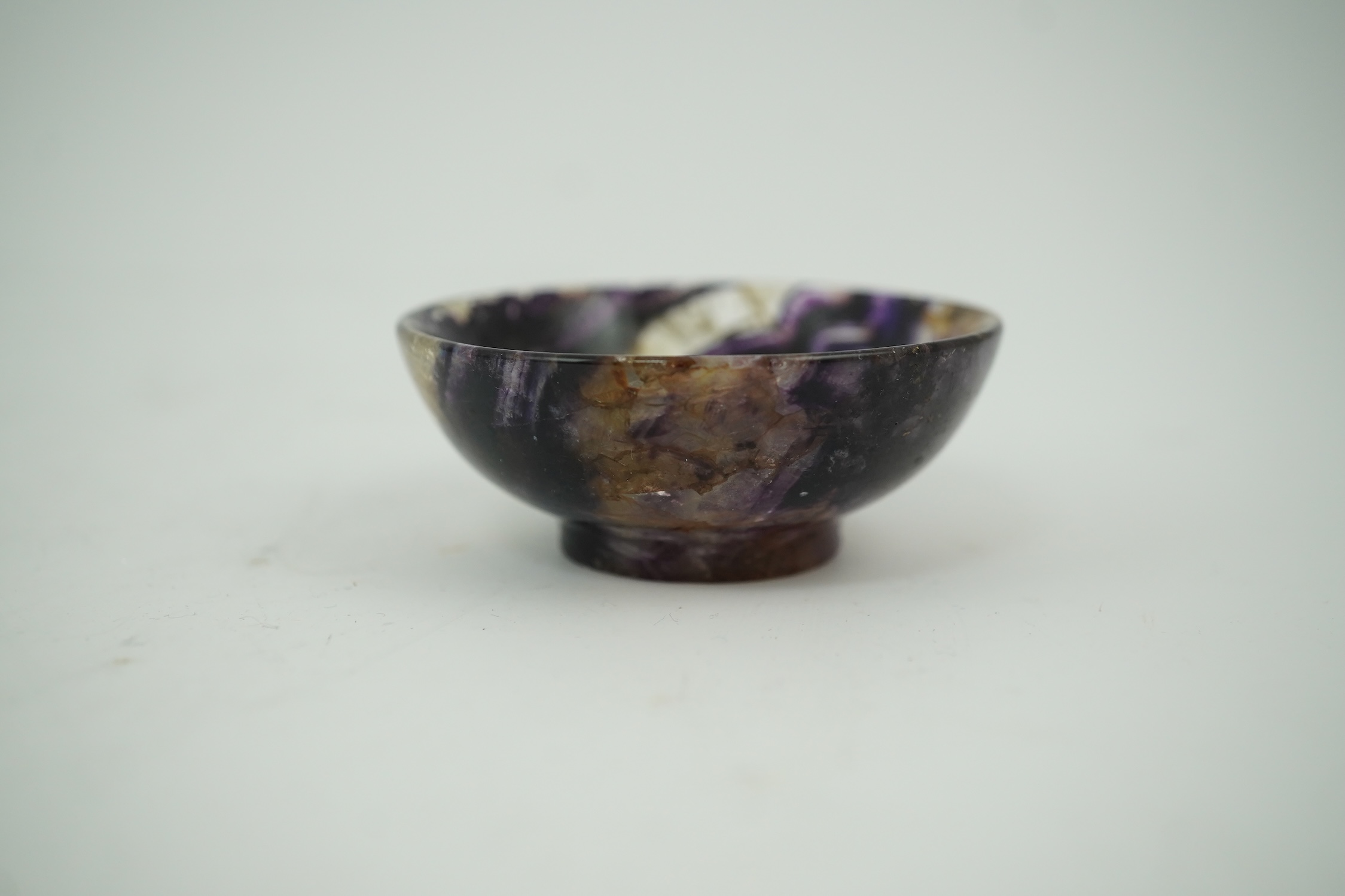 A small turned Blue John bowl, 6cm diameter. Condition - good